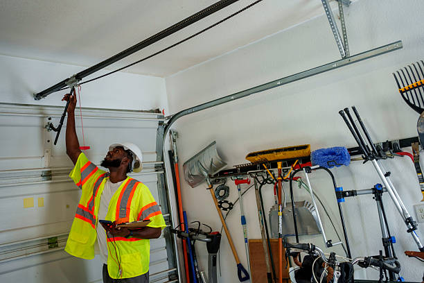 Professional Garage Door Panel Replacement technician working in Stigler, OK